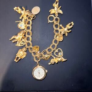 Vintage Kirks Folly Secret Of The Seven Angels Goldtone Charm Watch Bracelet SZ7